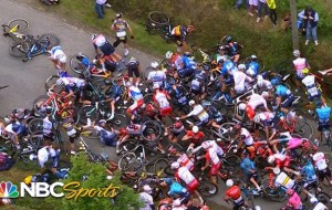 Fan with sign causes huge pile-up in Stage 1 of the Tour de France